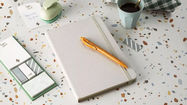 Cuadernos personalizados con banda elástica